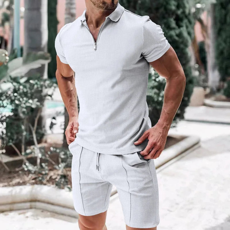 Andningsbart och stiligt sommarset med polotröja och shorts för herrar – Nilo