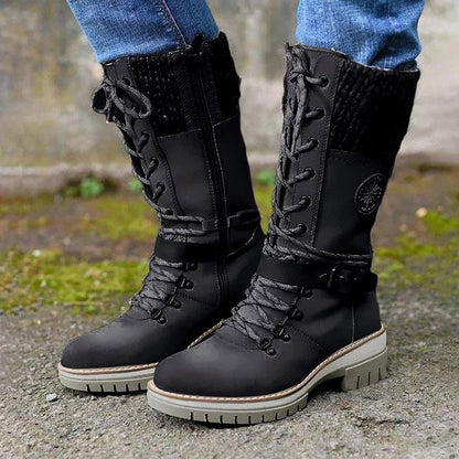 Schwarze Damen-Winterstiefel mit Schnürung, wasserdicht, rutschfeste Sohle, Outdoor geeignet.