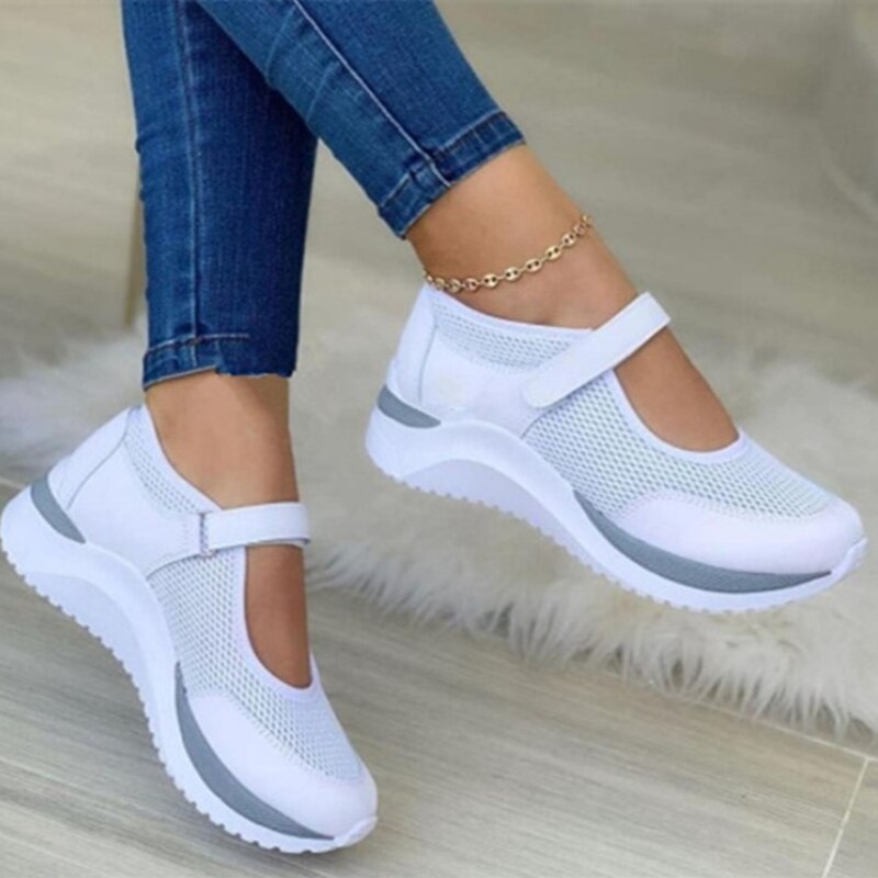 Weiße Damen-Sneaker mit Klettverschluss, atmungsaktiv, sportlich, bequem, modisch.
