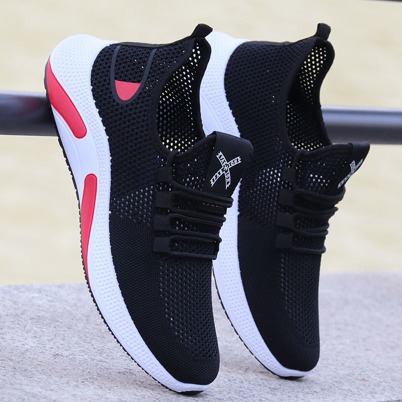 Schwarze Sportschuhe mit rotem Akzent, atmungsaktives Mesh, rutschfeste Sohle, Herren Sneaker.