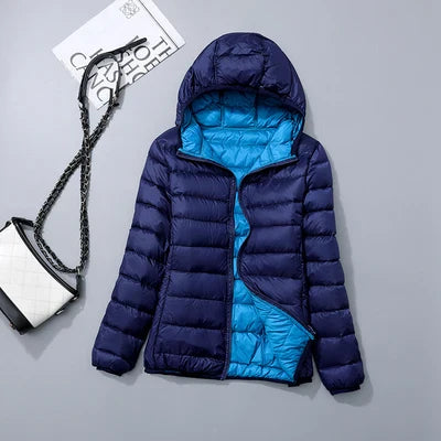 Vändbar dunjacka med huva – Soraya