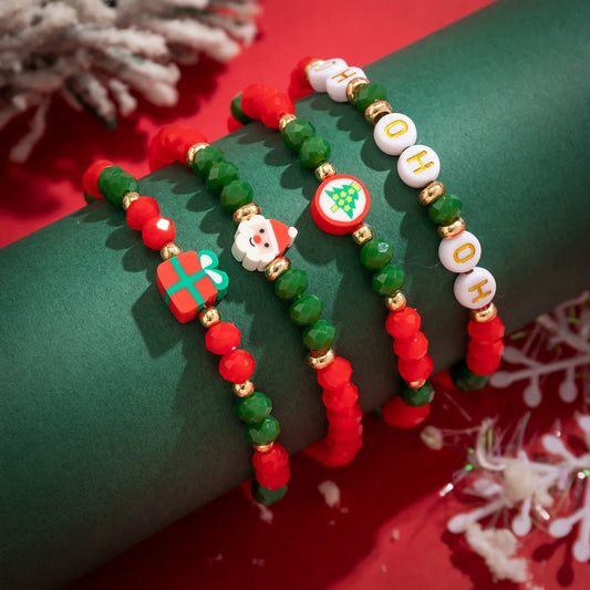 Weihnachtsarmbänder rot-grün, Perlen, Geschenk, Santa, Tannenbaum, festlicher Schmuck.