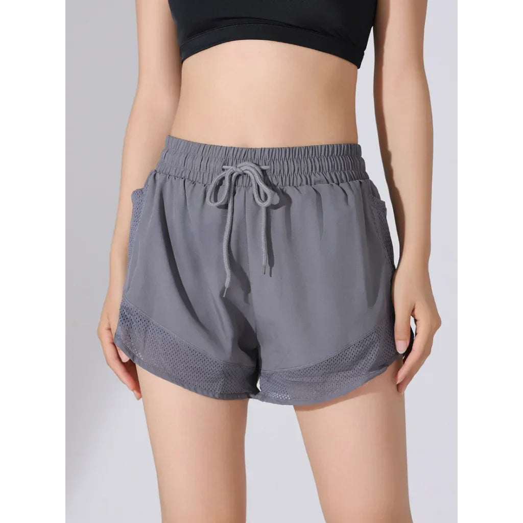 Andningsbara & Snabbtorkande Högmidjade Träningsshorts Dam – Mira