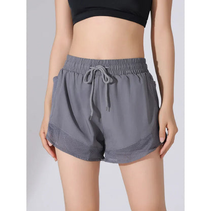 Andningsbara & Snabbtorkande Högmidjade Träningsshorts Dam – Mira