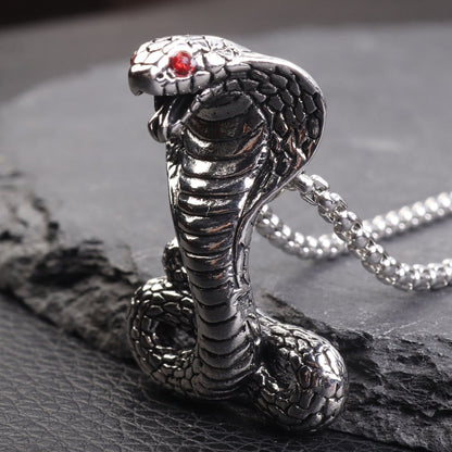 Silberne Kobra-Anhänger Halskette mit rotem Auge, Schlangenschmuck, Edelstahl, Herren Accessoire.