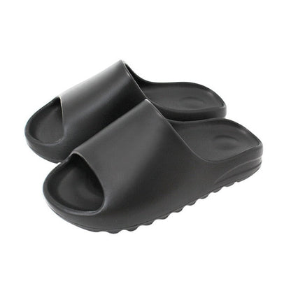 Schwarze Badeschlappen aus Gummi, rutschfest, bequem, für Damen und Herren.