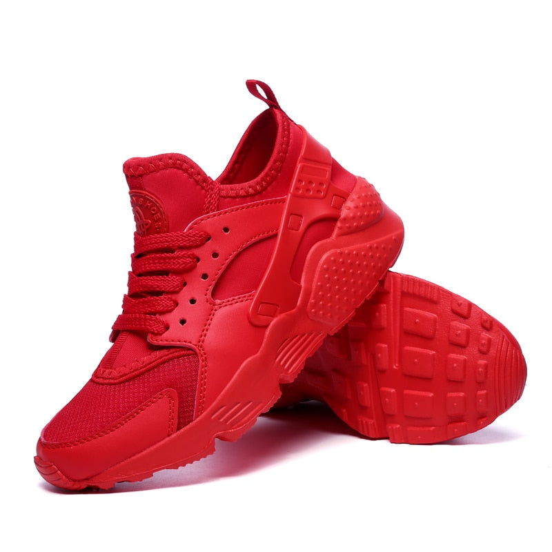 Rote Sneaker, sportlich, atmungsaktiv, Unisex, modisch, bequem, Freizeit, Turnschuhe.