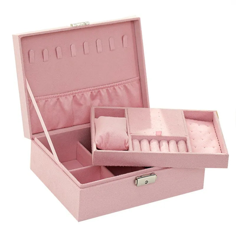 Rosa Schmuckkästchen aus Samt mit Fächern, ideal zur Schmuckaufbewahrung und Organisation.