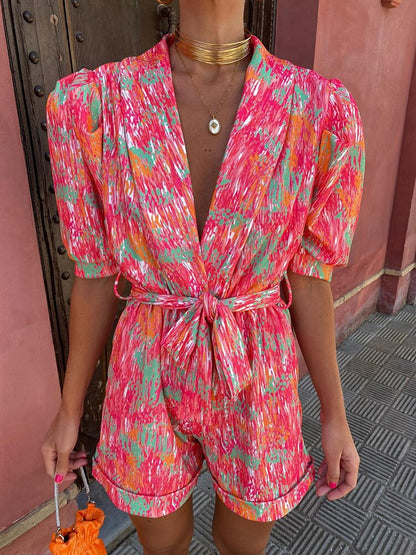 Trendig playsuit med festivaltryck och bälte – Leona