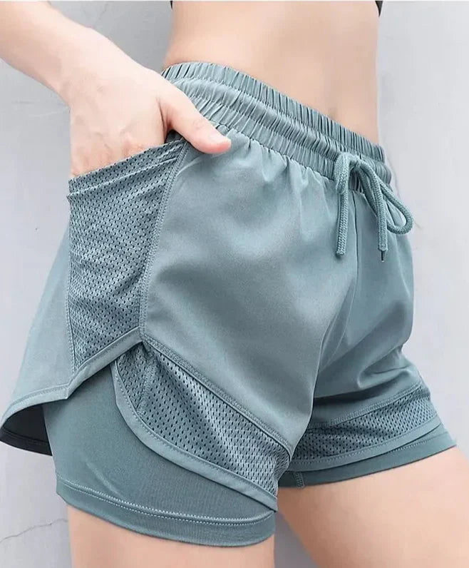 Andningsbara & Snabbtorkande Högmidjade Träningsshorts Dam – Mira
