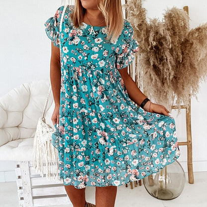 Boho-blommig klänning med volanger och midjesnitt – Calista