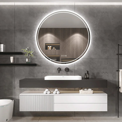 Runder LED-Badezimmerspiegel, beleuchtet, modernes Design, über Waschbecken, graue Wand.