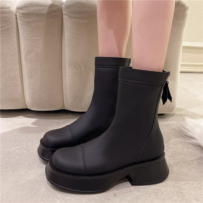 Schwarze Damenstiefeletten aus Leder mit Blockabsatz, modisch und elegant.