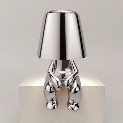 Silberne Tischlampe in menschlicher Form, modernes Design, Metall, dekorative Beleuchtung.
