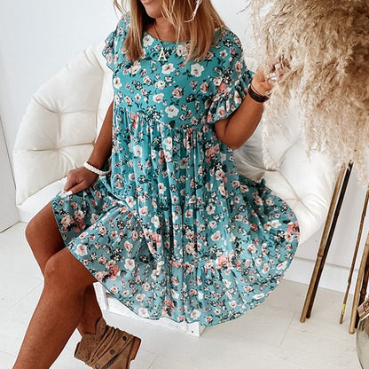 Boho-blommig klänning med volanger och midjesnitt – Calista
