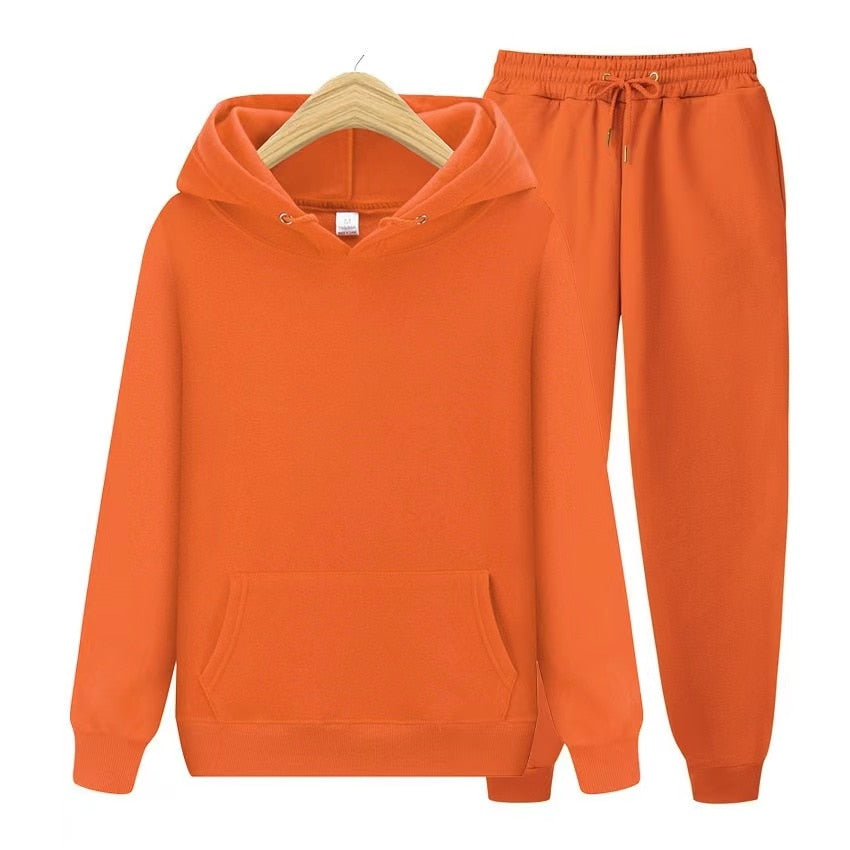 Orangefarbener Kapuzenpullover und Jogginghose Set, Baumwolle, Unisex, Freizeitkleidung.