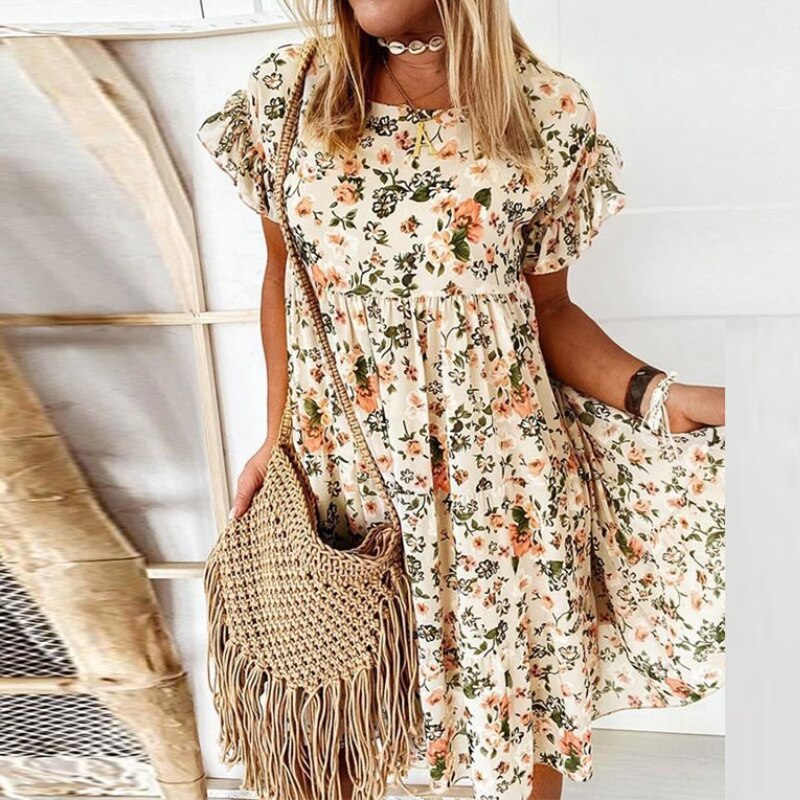 Boho-blommig klänning med volanger och midjesnitt – Calista