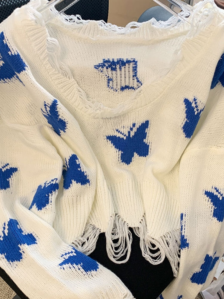 Weißer Strickpullover mit blauen Schmetterlingen, V-Ausschnitt, Fransen, Damenmode.