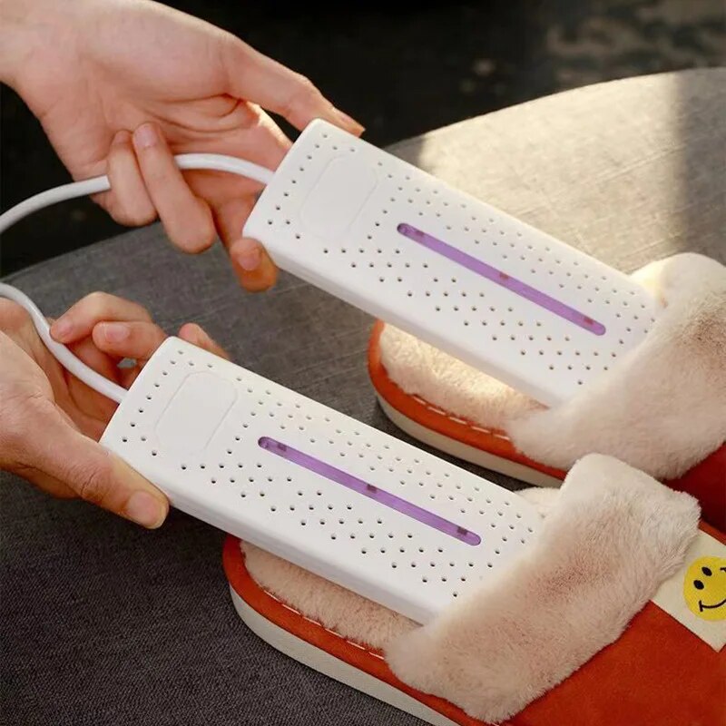 Weiße elektrische Schuh- und Socken-Trockner, tragbar, faltbar, für schnelle Trocknung.