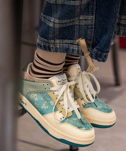 Stiliga unisex konst-sneakers med mandelblomstryck – Arta