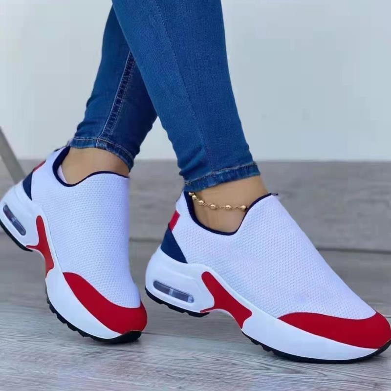 Weiße Damen-Sneaker mit rotem und blauem Akzent, atmungsaktiv, sportlich, bequem.
