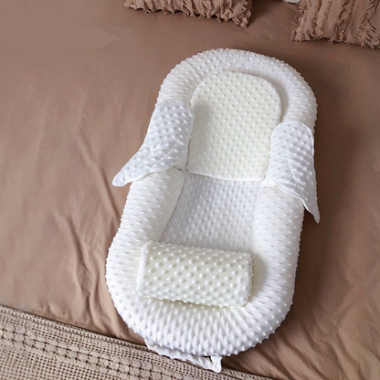 Ergonomiskt babynäste med ryggstöd och mesh-sovyta – Cosynido