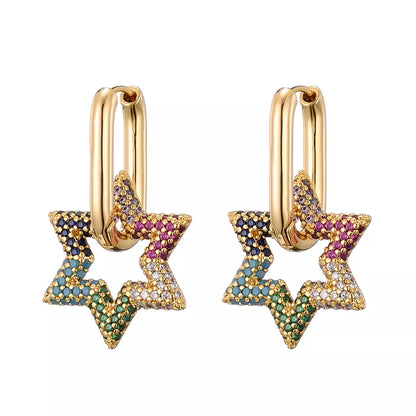 Goldene Stern-Ohrringe mit bunten Kristallen, modischer Schmuck, Damen-Accessoire.