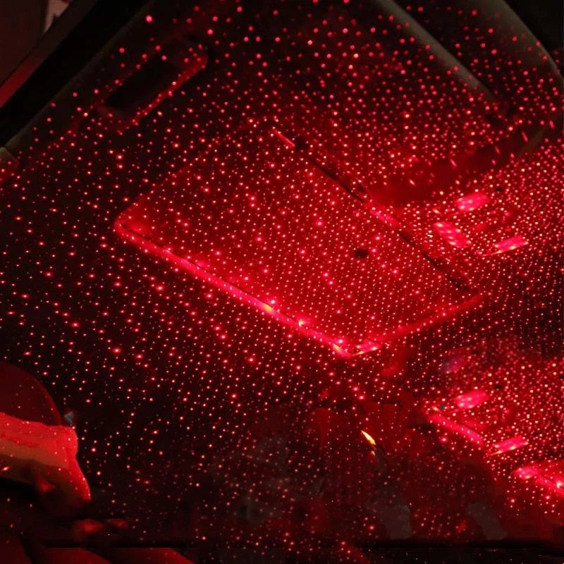 Rote LED-Sternenhimmel-Projektion im Auto, stimmungsvolle Beleuchtung, Innenraumdekor.