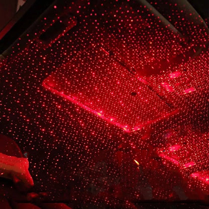 Rote LED-Sternenhimmel-Projektion im Auto, stimmungsvolle Beleuchtung, Innenraumdekor.