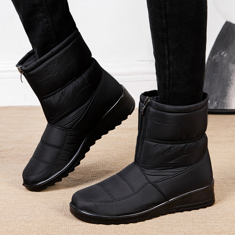 Schwarze Winterstiefel mit Reißverschluss, warm gefüttert, rutschfeste Sohle, Damenmode.
