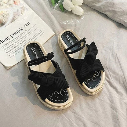 Schwarze Damen-Sandalen mit Schleife, flach, Sommermode, rutschfest, bequem, elegant.