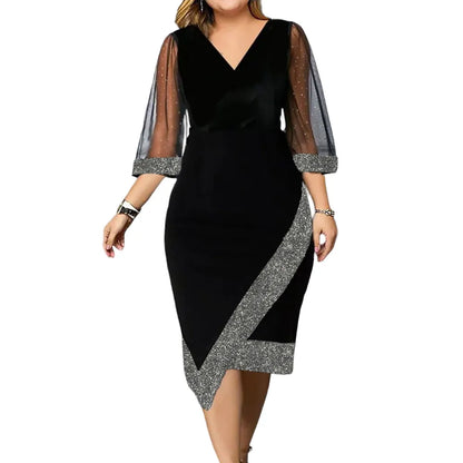 Schwarzes Abendkleid mit transparenten Ärmeln und silbernen Glitzerakzenten, elegantes Design.