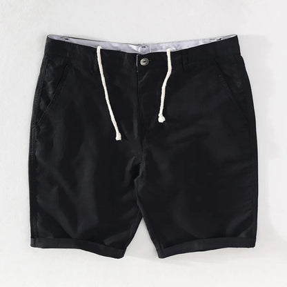 Strandshorts för herr i linne-bomull, sommarlook med knappstängning - Sandro