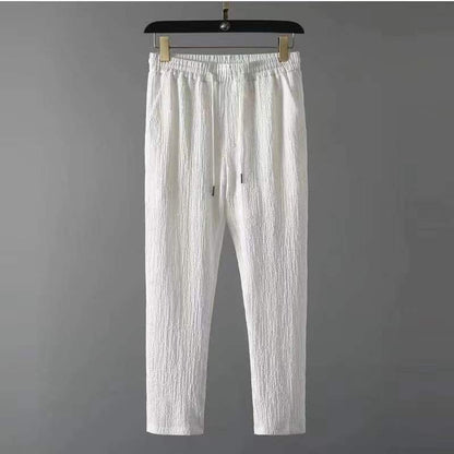 Weiße Herren-Leinenhose, lässig, Sommermode, elastischer Bund, atmungsaktiv, bequem.