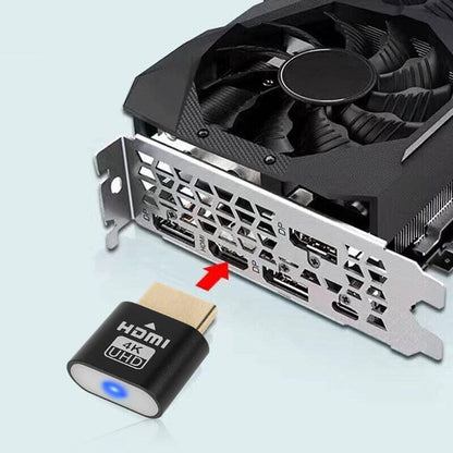 Svart HDMI-enhet med röd pil som pekar mot HDMI-uttaget på baksidan av ett grafikkort. 9
