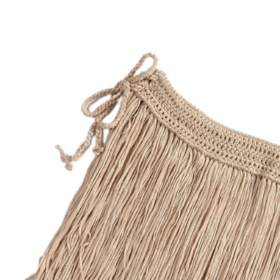 Beige Quastenborte aus Baumwolle, dekorativ, handgefertigt, ideal für DIY-Projekte und Wohnaccessoires.