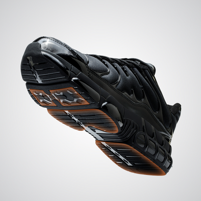 Schwarzer Sneaker, Gummisohle, Sport, Herren, Nike, seitliche Ansicht, modernes Design