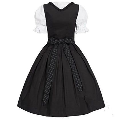 Schwarzes Dirndlkleid mit weißer Bluse und gepunkteter Schleife, traditionell, elegant.