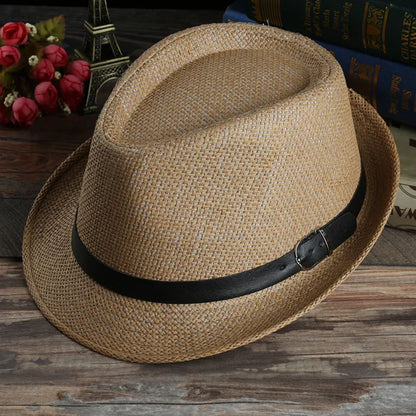 Brauner Strohhut mit schwarzem Band, klassisches Design, ideal für Sommermode und Sonnenschutz.