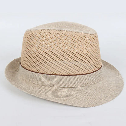 Beiger Fedora-Hut aus Stroh mit braunem Band, atmungsaktiv, ideal für Sommermode.