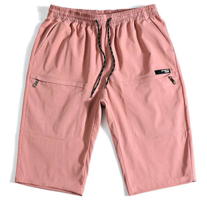Rosa Herren-Shorts mit Kordelzug, Taschen, Reißverschlüssen, lässig, bequem, Sommermode.