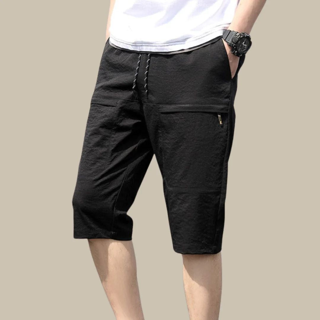 Schwarze Herren-Shorts, knielang, mit Reißverschlusstasche, lässig, Baumwolle.