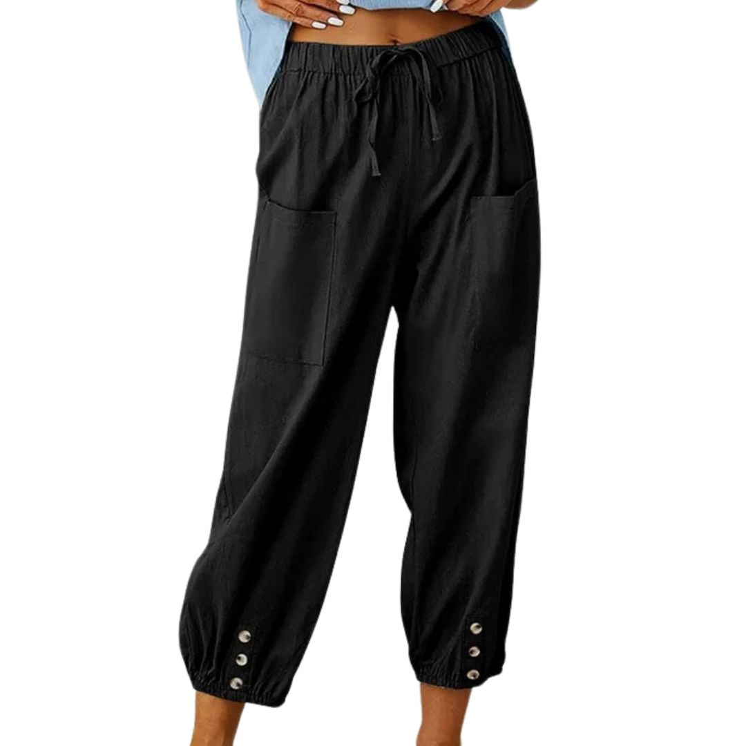 Schwarze Damenhose mit Taschen, elastischem Bund, Knöpfen, lässig, bequem, modisch.