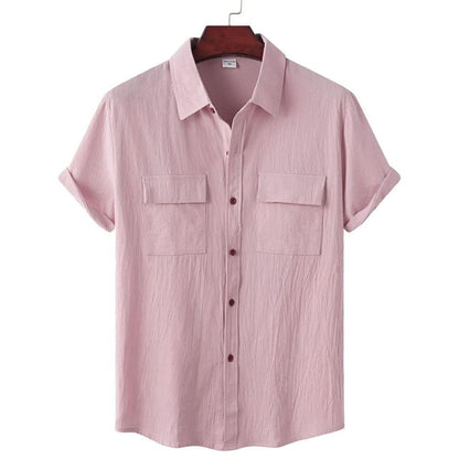 Rosa Damenbluse, kurzärmelig, Baumwolle, Knopfleiste, zwei Brusttaschen, lässiger Stil.