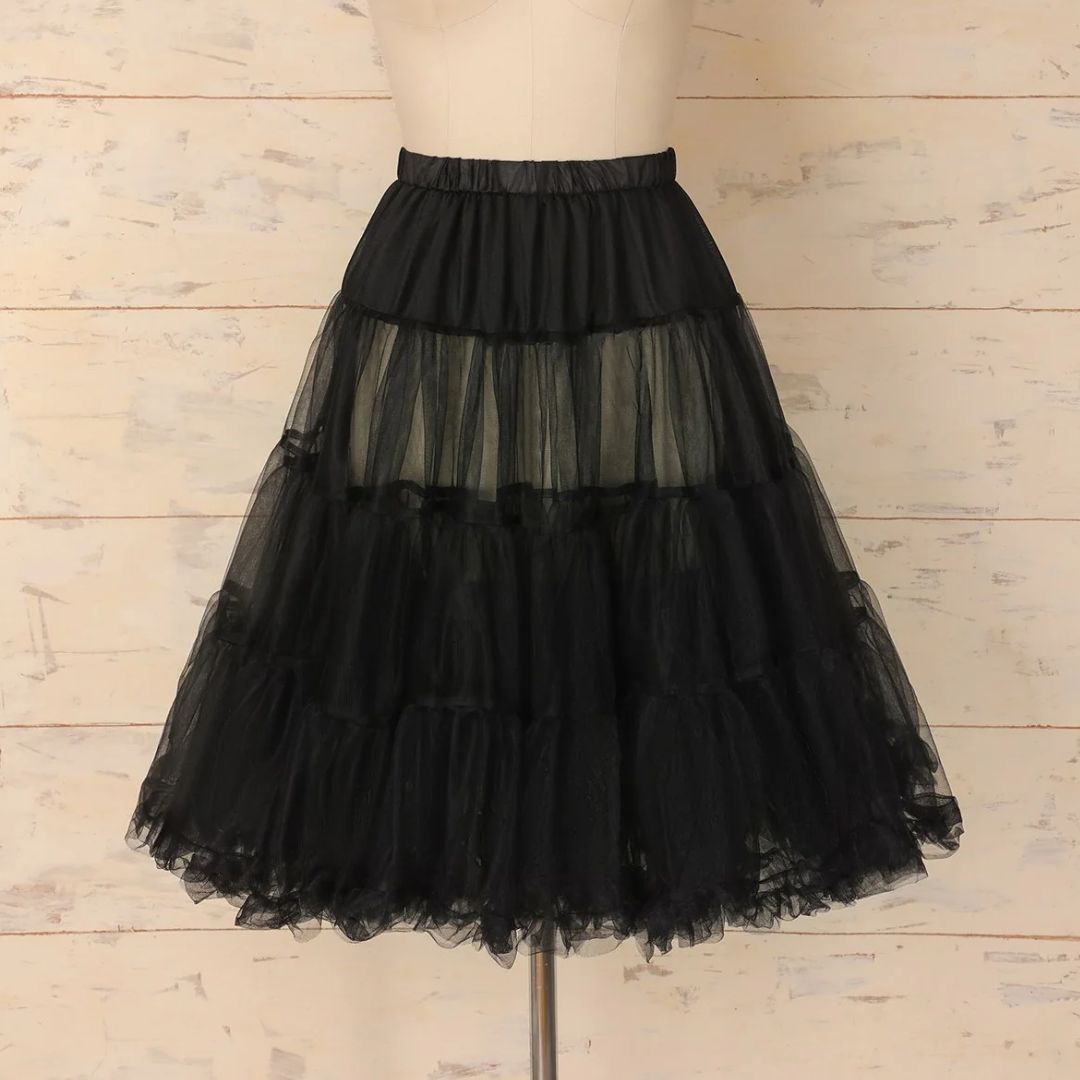 Schwarzer Tüllrock, mehrlagig, knielang, elastischer Bund, Damenmode, elegant, festlich.
