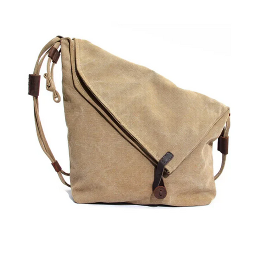 Beige Umhängetasche aus Segeltuch mit Lederdetails, lässig, modisch, ideal für den Alltag.