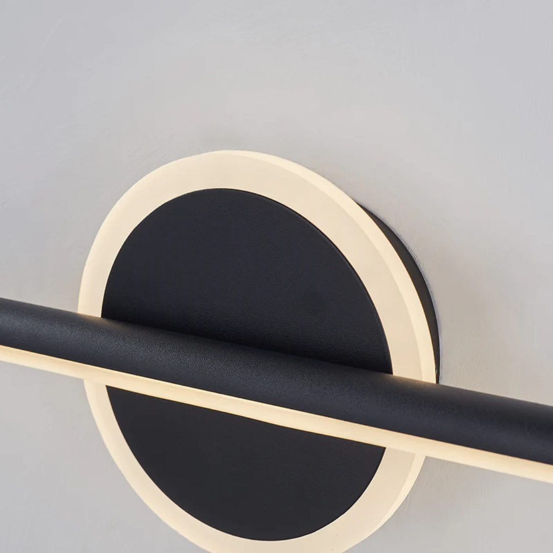 Schwarze LED-Wandleuchte, rund, modern, energiesparend, für Innenräume.