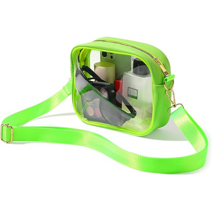 Neon-grüne transparente Umhängetasche, ideal für Reisen, mit Kosmetik und Sonnenbrille.