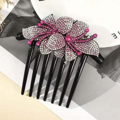 Schwarzer Haarkamm mit rosa Schmetterlings-Strassdesign, elegantes Haaraccessoire.