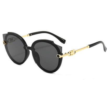 Schwarze Designer-Sonnenbrille, runde Gläser, goldene Bügel, modisch, UV-Schutz.